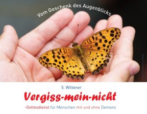 Ein Schmetterling in den offenen Händen eines Menschen, darunter der Schriftzug "5. Wittener Vergiss-mein-nicht-Gottesdienst für Menschen mit und ohne Demenz"
